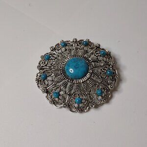 Large Round Silver Tone And Blue Brooch